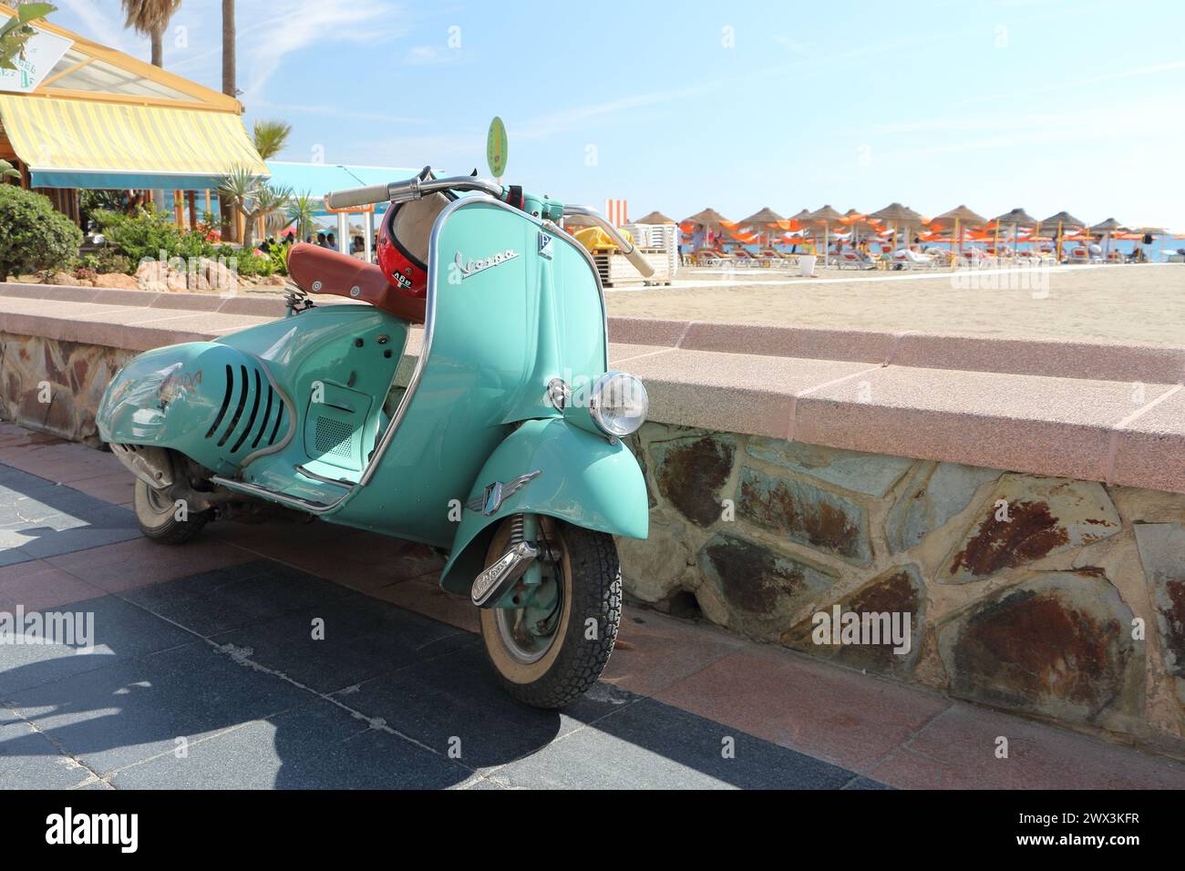 modified Vespa parked on the Torremolinos promenade, Málaga, Spain. Stock Photo