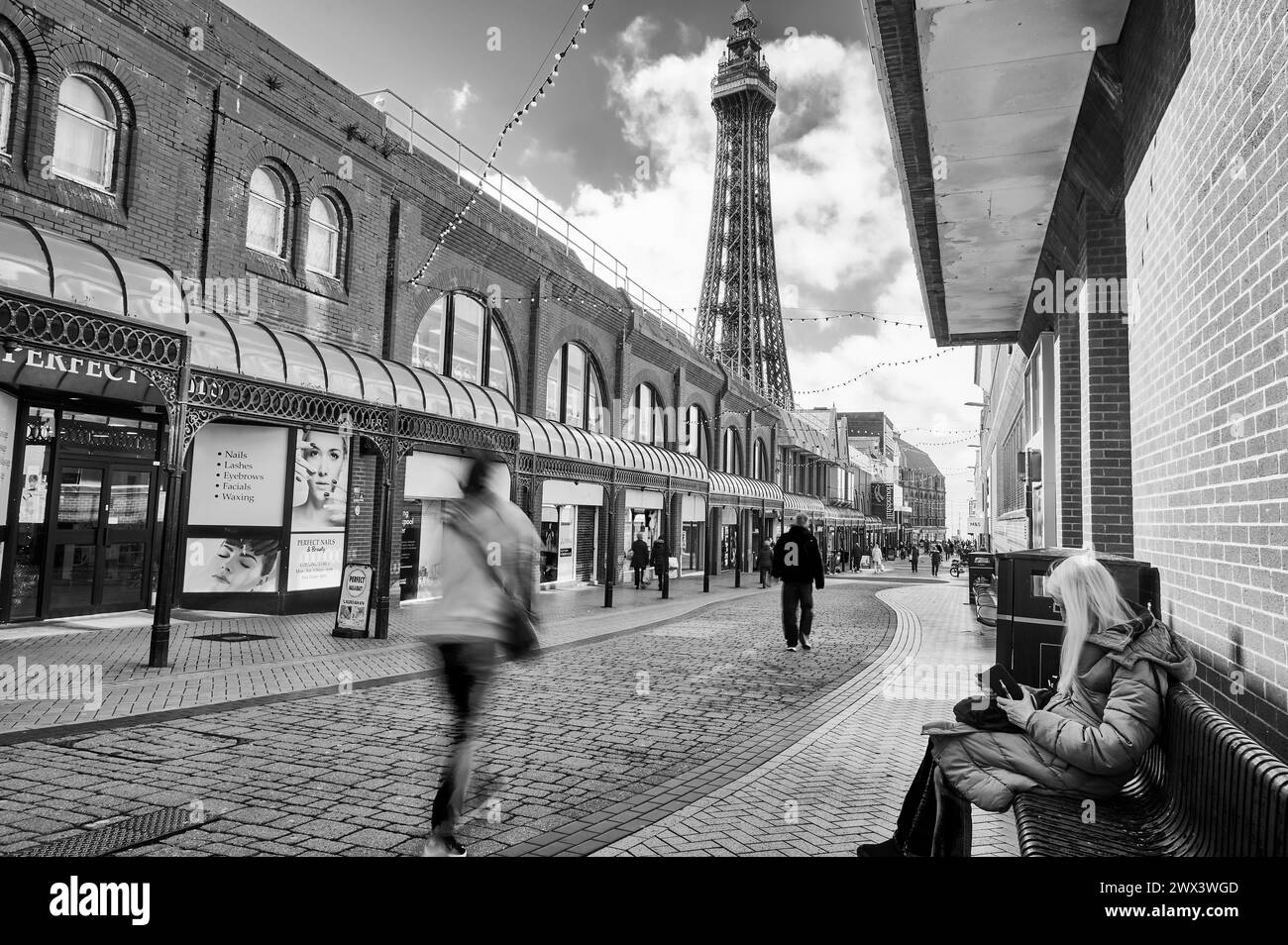 Shops,shoppers and other businesses along  Victoria Street,Blackpool Stock Photo