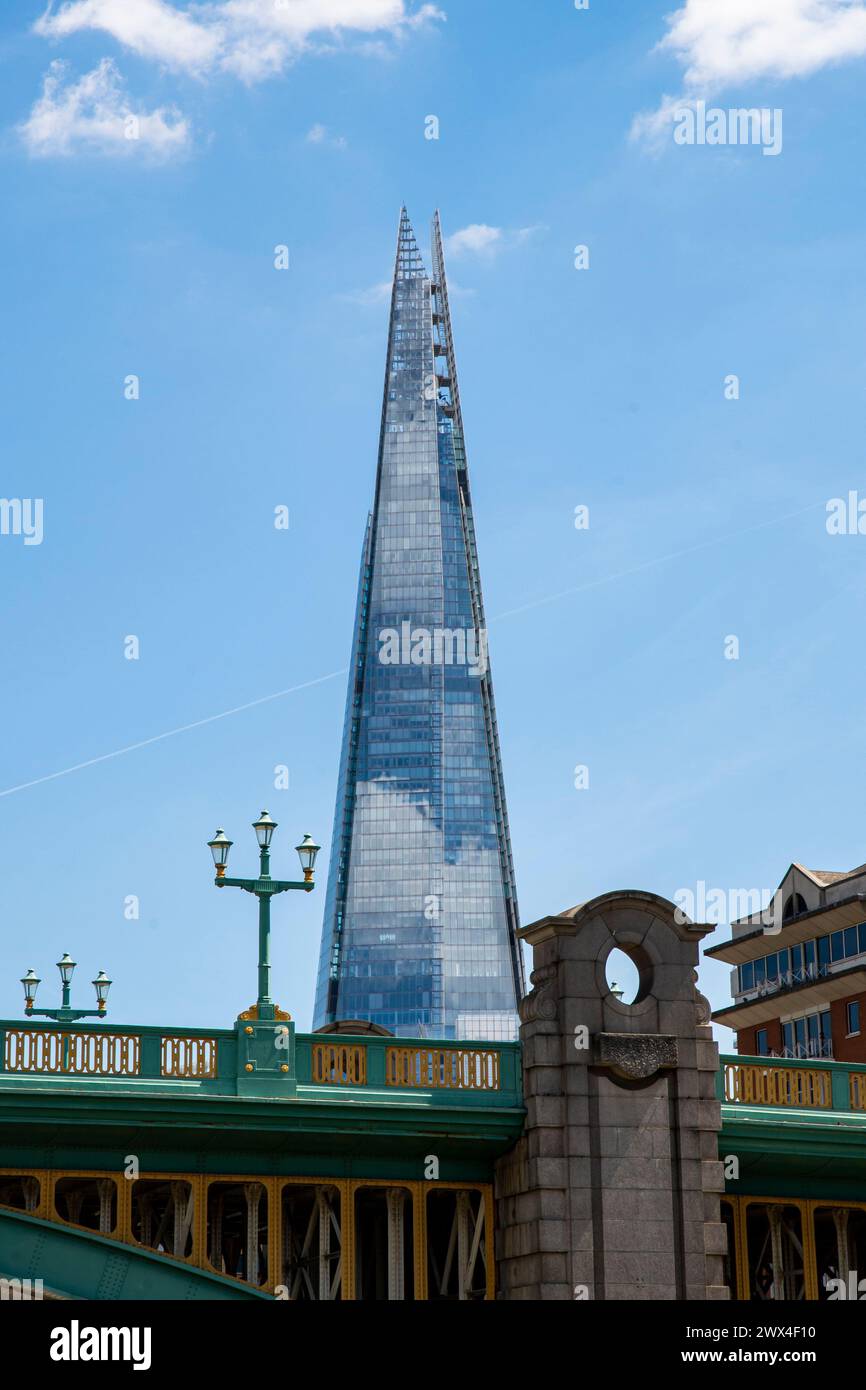 The Shard looms majestically over London, a striking example of modern architecture Stock Photo