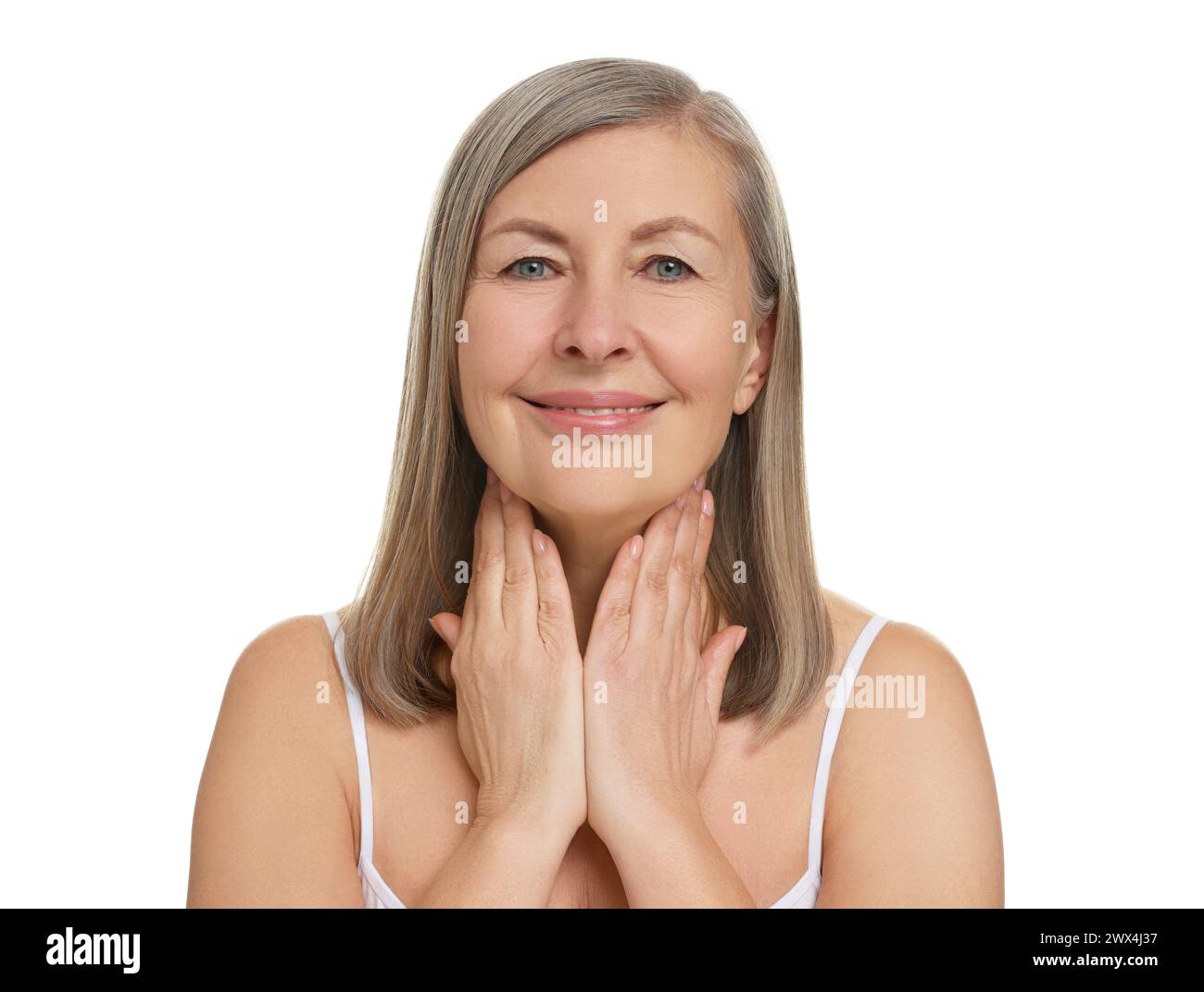 Beautiful woman touching her neck on white background Stock Photo - Alamy