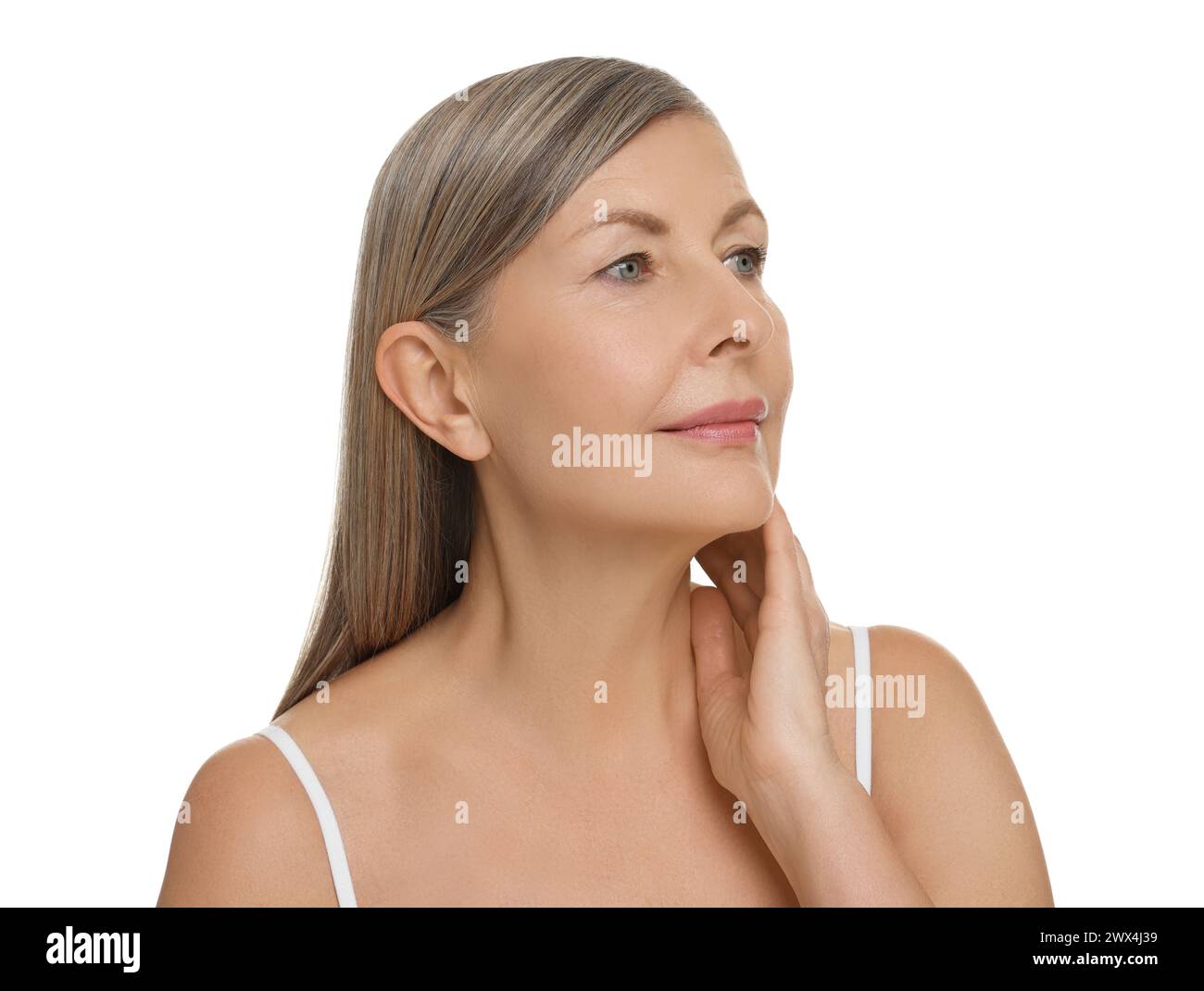 Beautiful woman touching her neck on white background Stock Photo - Alamy
