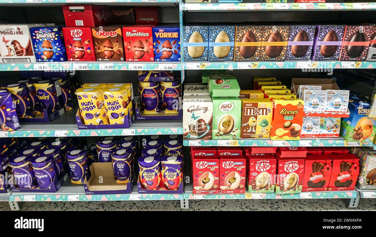 Variety of Easter Chocolate Eggs on Supermarket Shelf with Prices 2024 Stock Photo