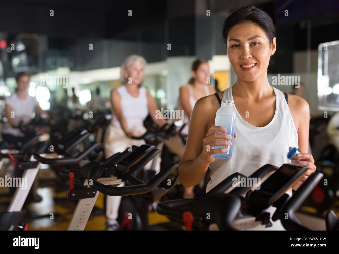 Japanese woman standing gym smiling hi-res stock photography and images ...