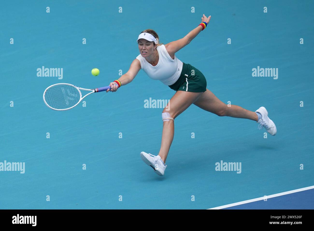 Miami, Florida, USA. 27th Mar, 2024. Danielle Collins (USA) hits a forehand against Caroline Garcia (France) during the quarterfinals of women's singles at the Miami Open tennis tournament. Collins won the match 6-3, 6-2. (Credit Image: © Richard Dole/ZUMA Press Wire) EDITORIAL USAGE ONLY! Not for Commercial USAGE! Stock Photo