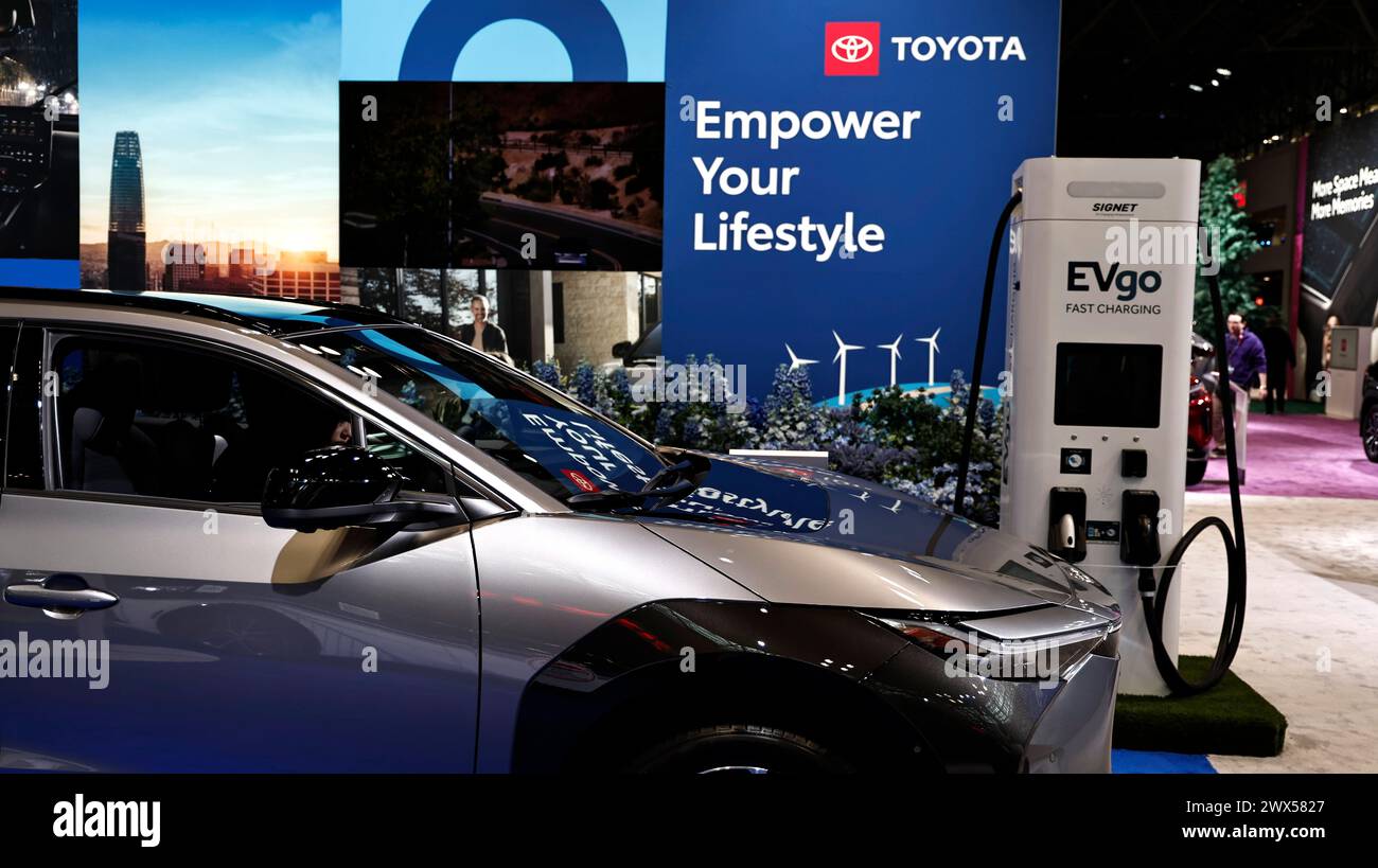 Toyota BZ4X charging from a EVGo station during press day at the New ...