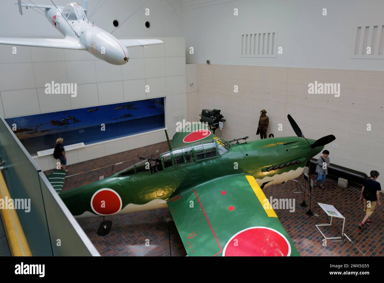 A rocket powered human-guided kamikaze attack-aircraft Ohka with a Japanese navy dive-bomber Suisei display in Yushukan Museum.Yasukuni Shrine.Tokyo.Japan Stock Photo