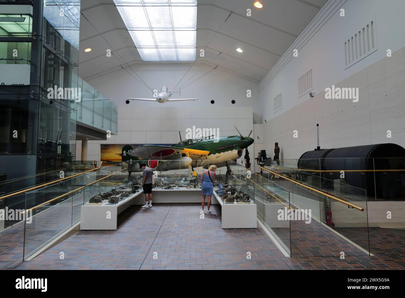 Interior view of Yushukan Museum with an Imperial Japanese Navy dive-bomber Suisei and rocket powered glider bomb Ohka for Kamikaze attack. Yasukuni Shrine.Tokyo.Japan Stock Photo