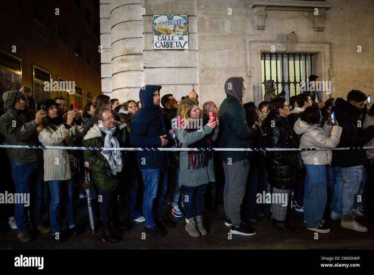 The public observes the processional passage with the image of Father ...