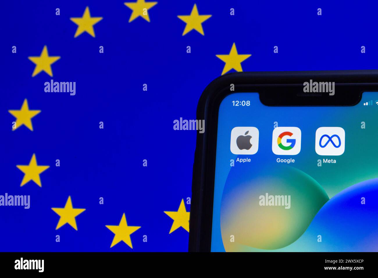 Apple, Google and Meta icons seen on display on the European flag background. Big tech GAFA companies in Europe, Digital Markets Act concept Stock Photo