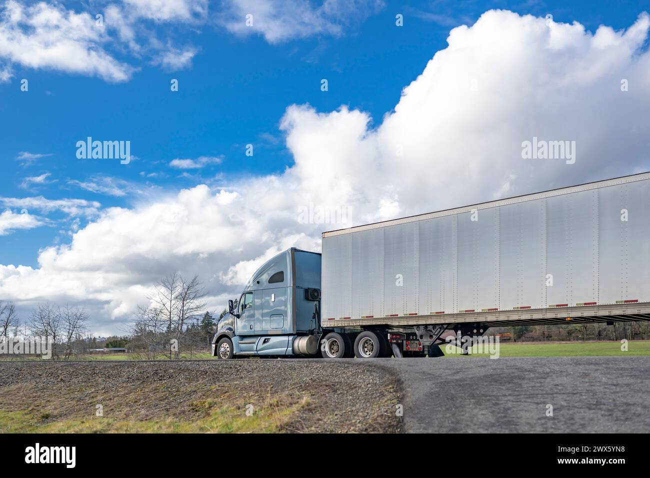 Blue Big Rigg Industrial blue classic big rig semi truck tractor with extended hi-res ...