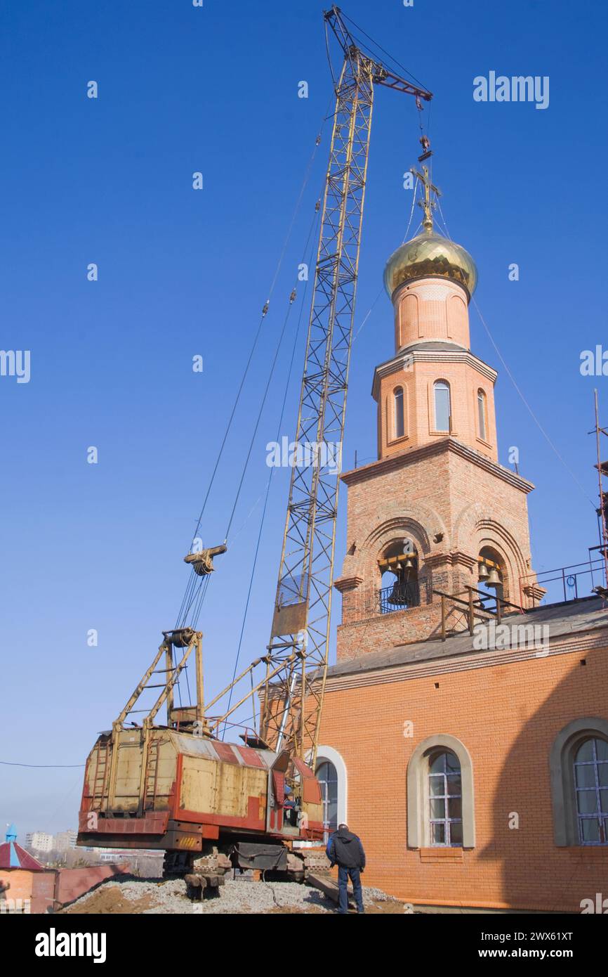 The construction of the beautiful Russian Christian church. Religion Stock Photo