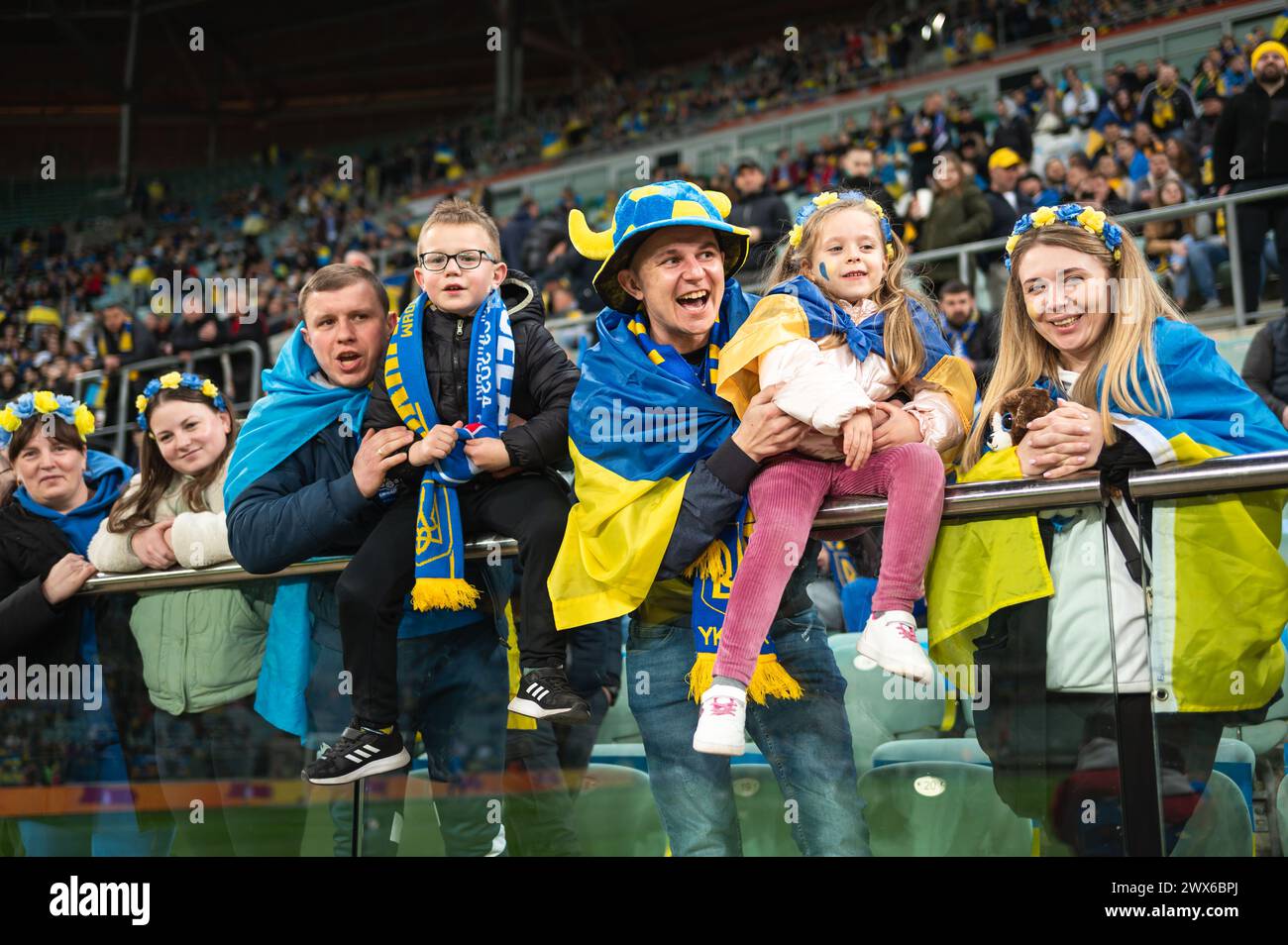 WROCLAW, POLAND - MARCH 26, 2024: Qualifications for UEFA Euro 2024. Final play-off match Ukraine - Iceland 2:1. Supporters of Ukraine Stock Photo