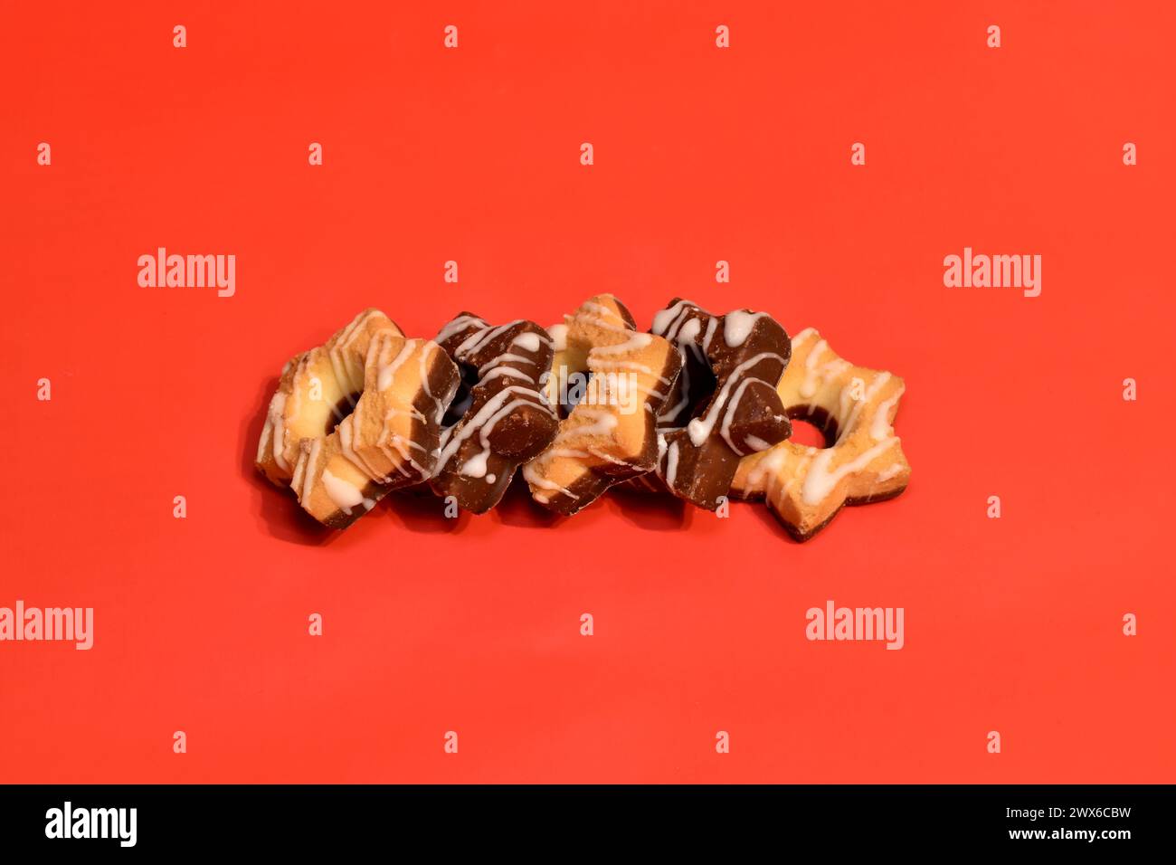In one row there are shortbread cookies with and without chocolate. Stock Photo