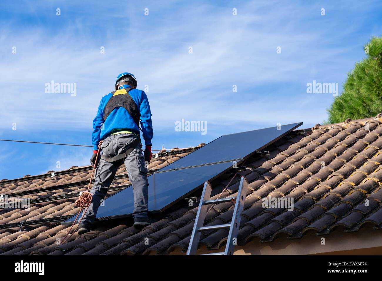 Engineer installing solar panels Stock Photo