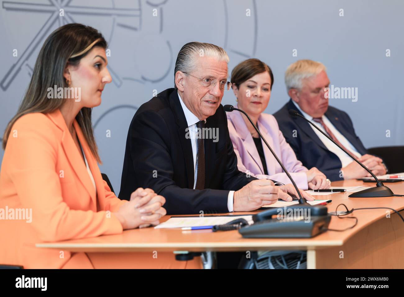 Duesseldorf, Germany. 28th Mar, 2024. Jochen Werner, CEO of Essen University Hospital (2nd from left), speaks alongside Ebru Yildiz (l), Head of the West German Center for Organ Transplantation, Sabine Deutscher (2nd from right), Member of the Board of AOK Rheinland/Hamburgauf and Karl-Josef Laumann (r, CDU), Minister of Health at a press conference on the current situation regarding organ donation in North Rhine-Westphalia. Together with the Ministry of Health, an initiative has launched the new campaign '#NRWEntscheidetSich'. Credit: Oliver Berg/dpa/Alamy Live News Stock Photo