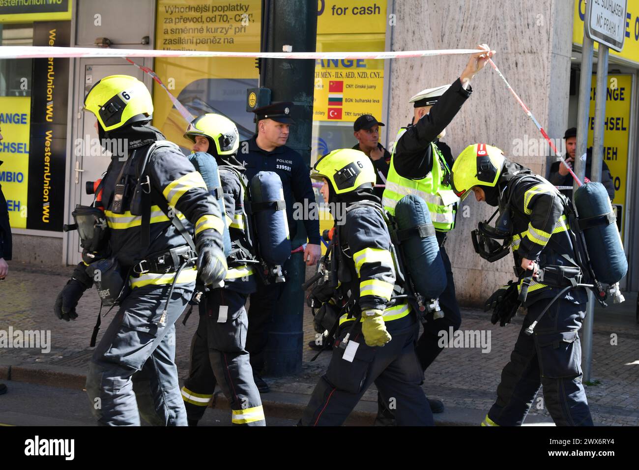 Prague, Czech Republic. 28th Mar, 2024. Firefighters intervene at a fire on the roof of a building in the central part of Wenceslas Square in Prague, Czech Republic, on March 28, 2024. Cardboard on the roof caught fire, thick smoke was visible from far away. Credit: Dorota Holubova/CTK Photo/Alamy Live News Stock Photo