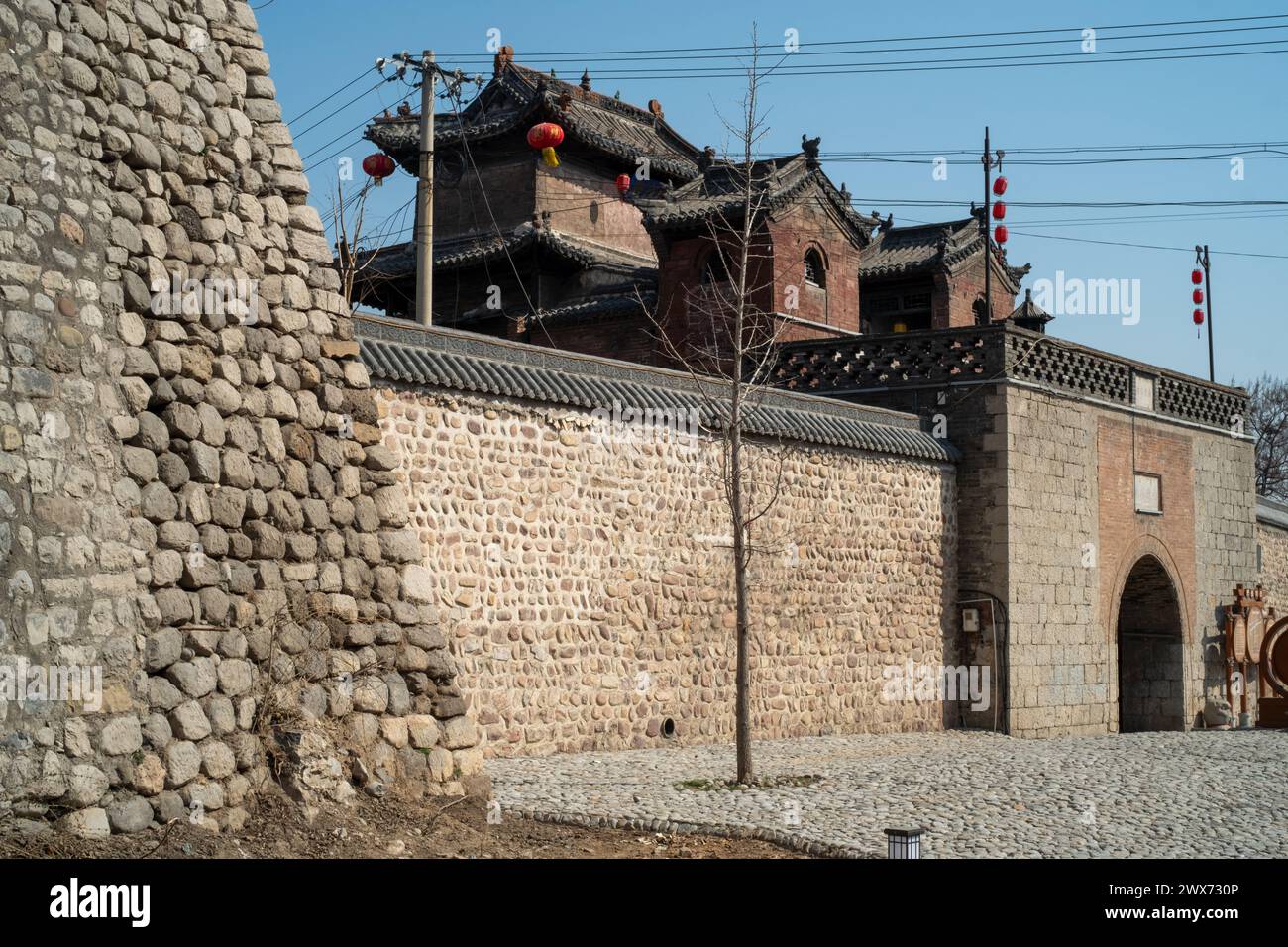 The old city wall of Jingxing, located in Jingxing County, Hebei Province, China, features extensive use of cobblestones for construction. Stock Photo