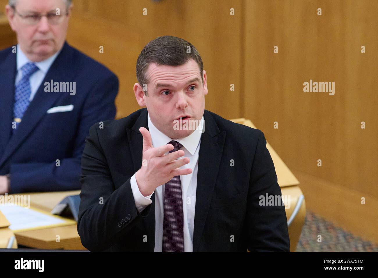 Edinburgh Scotland, UK 28 March 2024. Douglas Ross MSP at the Scottish Parliament for First Minister Questions. credit sst/alamy live news Stock Photo