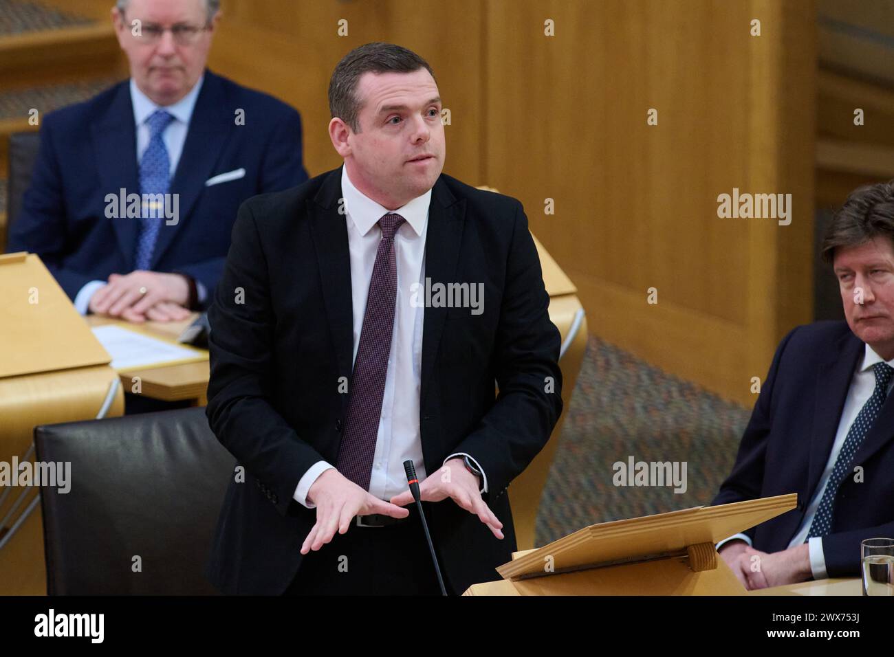 Edinburgh Scotland, UK 28 March 2024. Douglas Ross MSP at the Scottish Parliament for First Minister Questions. credit sst/alamy live news Stock Photo