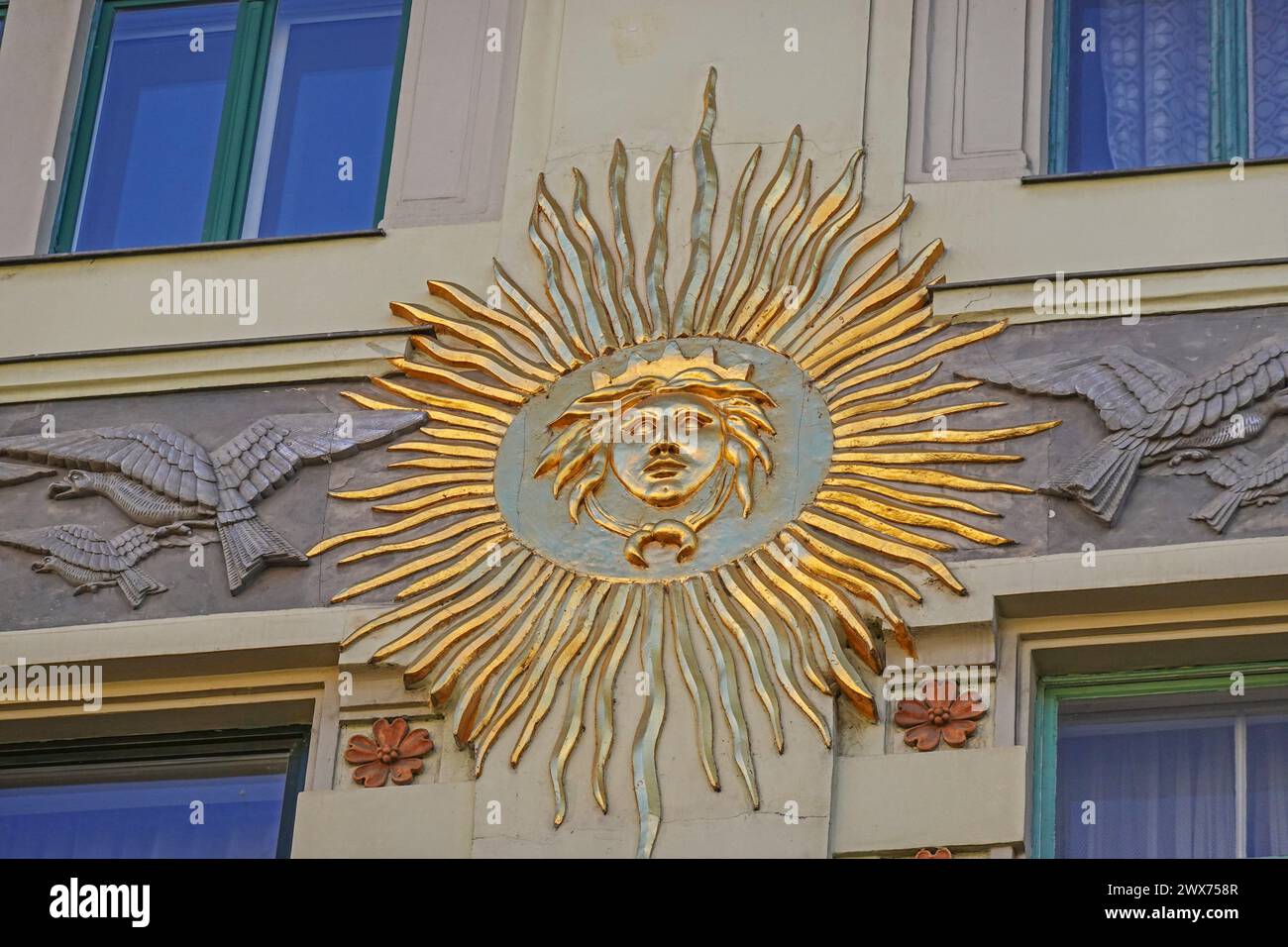 Hungary, Budapest, Lindenbaum House is the first Art Nouveau building in Budapest. Gold sun ornamentation on the facade   Photo © Fabio Mazzarella/Sin Stock Photo