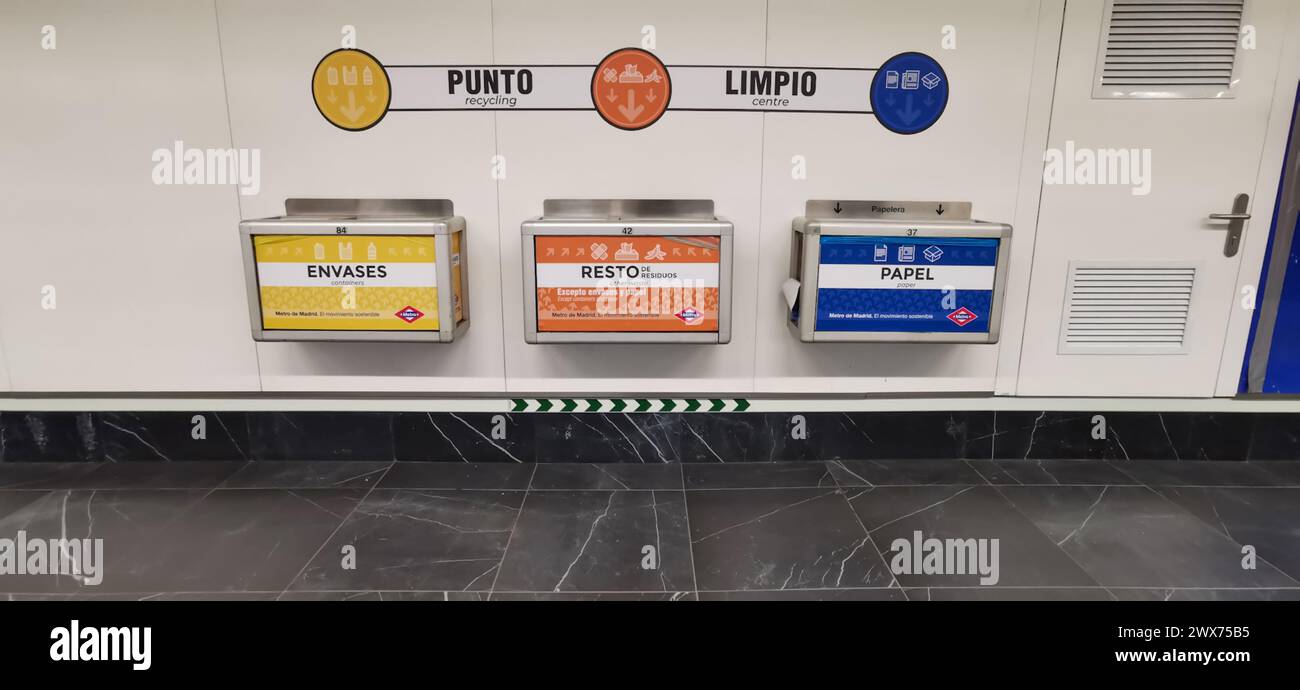Recycling bins at Madrid Avenida America metro station. Stock Photo