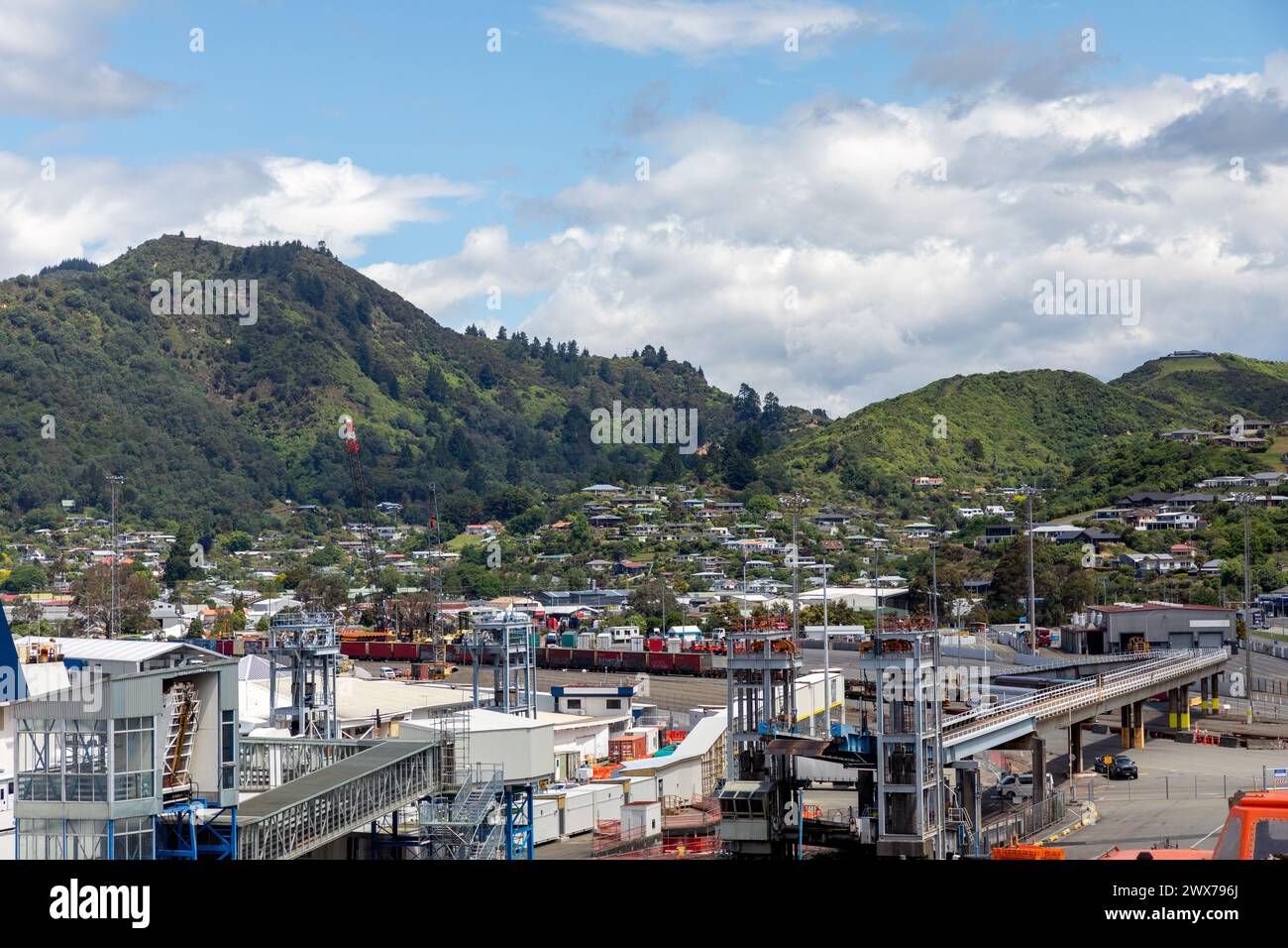The town of Picton is seen behind the ferry terminal on the north end of the South Island of New Zealand. Stock Photo