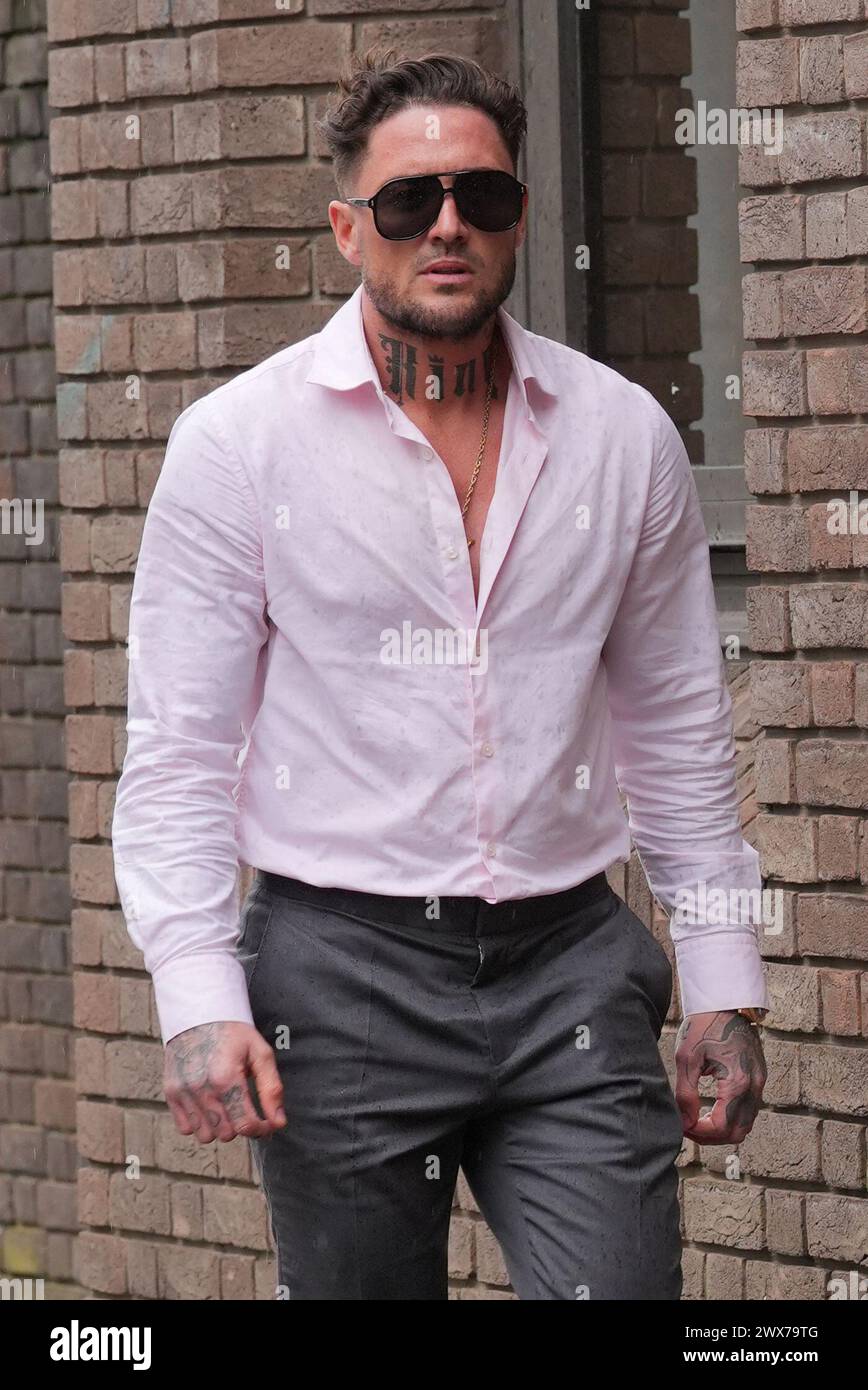 Stephen Bear arrives at Chelmsford Crown Court, Essex, for a confiscation hearing following his conviction for voyeurism and two counts of disclosing private sexual photographs and films with intent to cause distress, for posting a CCTV video of he and The Only Way Is Essex star Georgia Harrison having sex. Picture date: Thursday March 28, 2024. Stock Photo