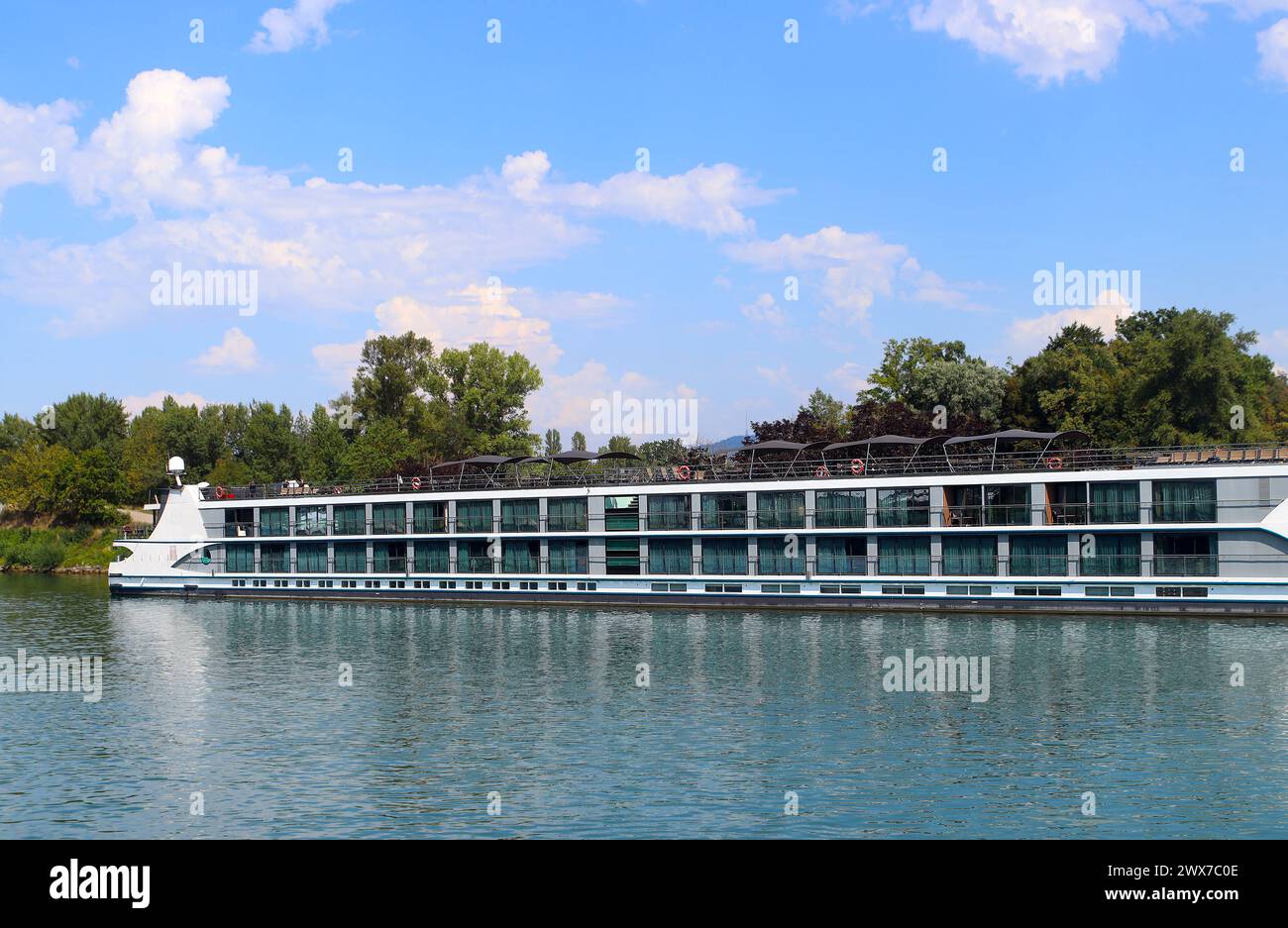 Cruise liner docked at the banks of river Rhine (Breisach, Germany) Stock Photo