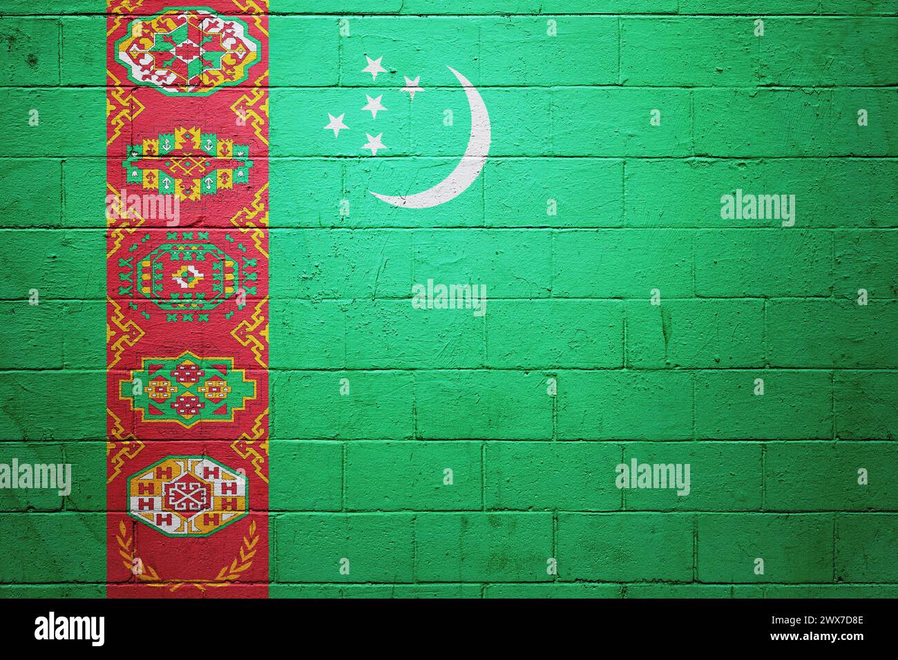 Flag of Turkmenistan painted on a cinder block wall Stock Photo - Alamy