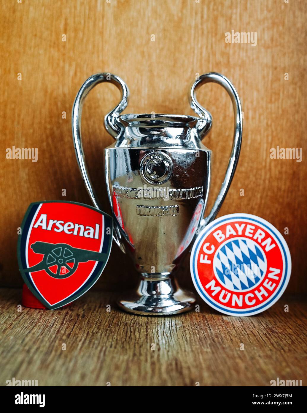 March 20, 2024, London, United Kingdom. The emblems of the football clubs participating in the Champions League playoffs are Arsenal London and Bayern Stock Photo