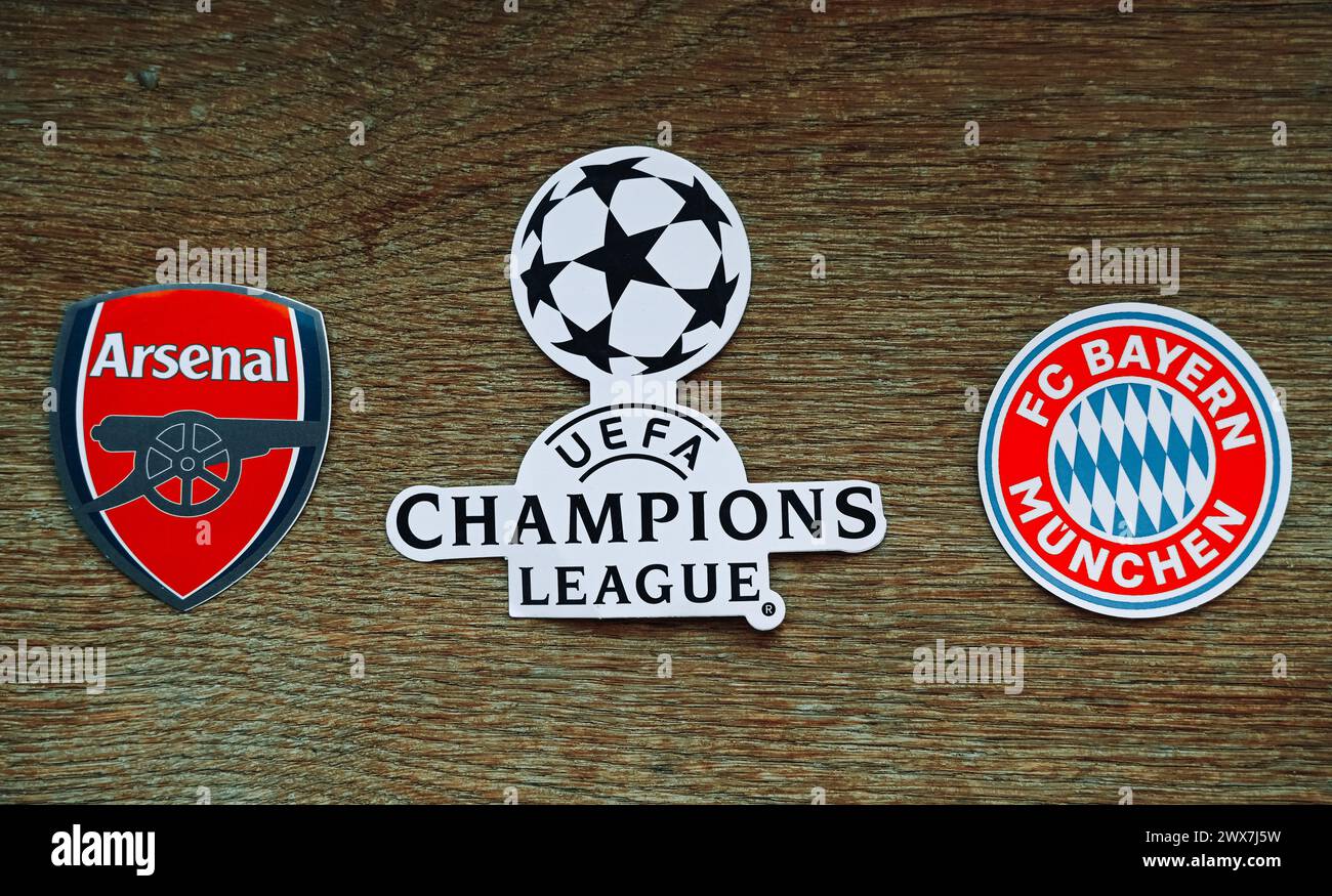 March 20, 2024, London, United Kingdom. The emblems of the football clubs participating in the Champions League playoffs are Arsenal London and Bayern Stock Photo