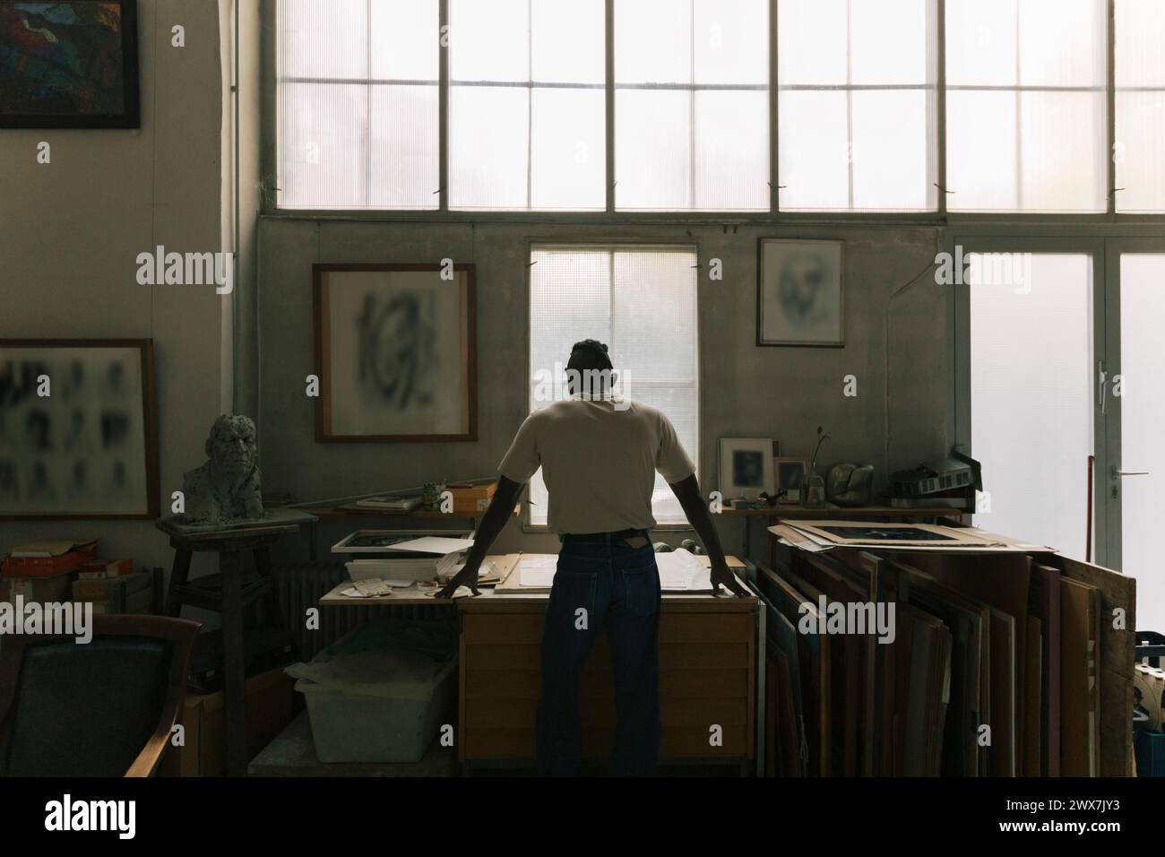 Rear view male artist hi-res stock photography and images - Alamy