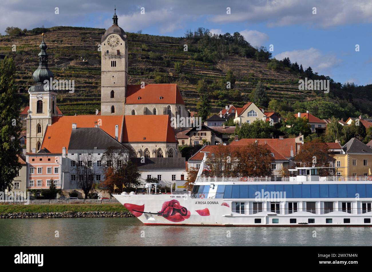 A Danube River cruise ship is docked at the historic city of Krems in Lower Austria's scenic Wachau Valley. Stock Photo