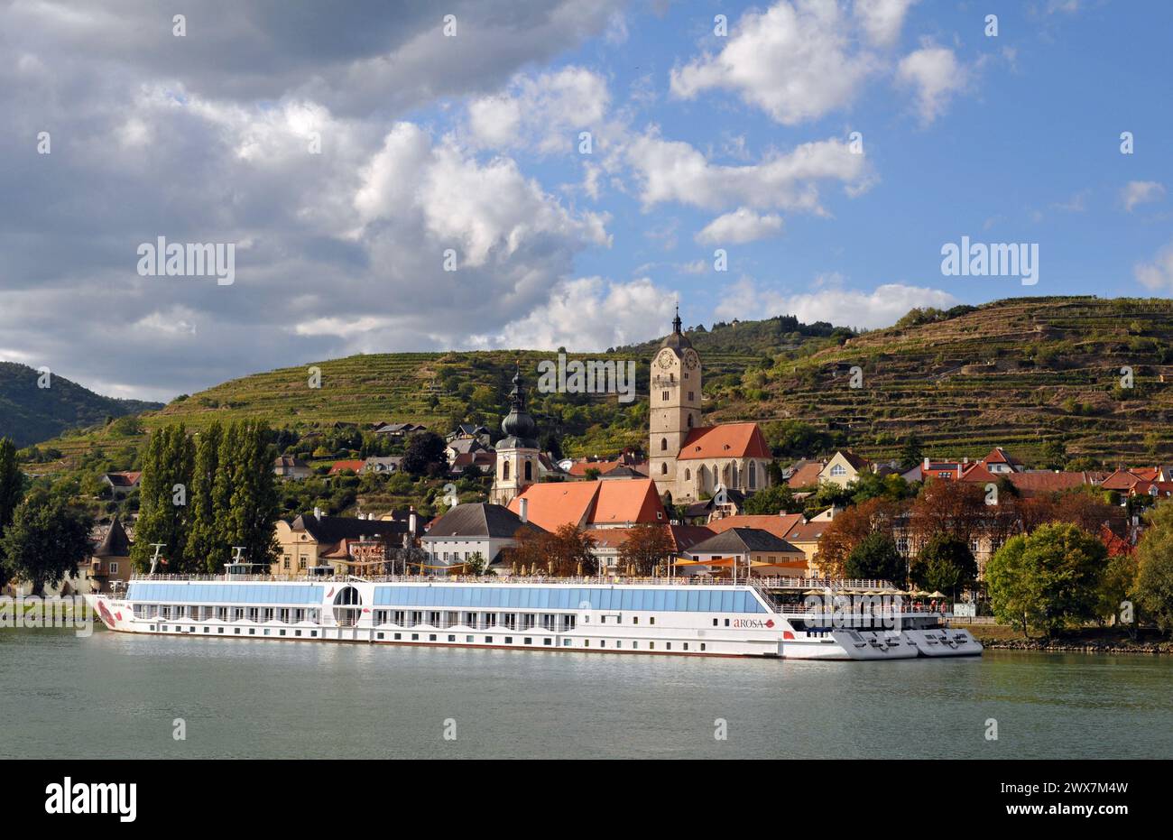 Danube River cruise ships docked at the historic city of Krems in Lower Austria's scenic Wachau Valley. Stock Photo
