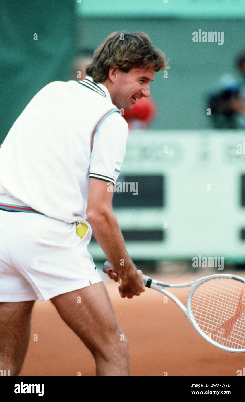 American tennis player Jimmy Connors playing a men's singles match of the French Open. Paris, Roland-Garros stadium, June 1991 Stock Photo