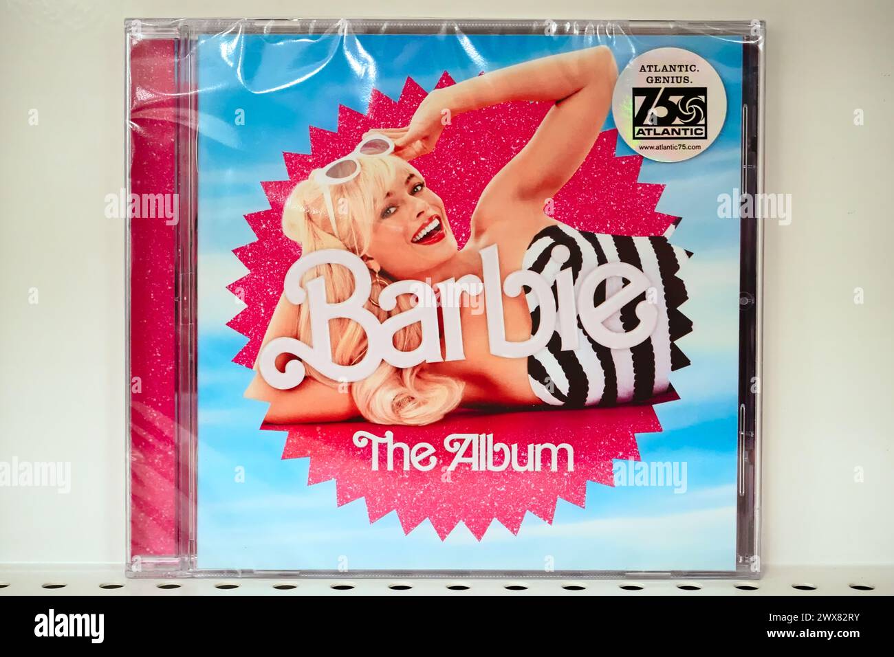 New York, NY - March 21, 2024: Barbie the Album, Barbie film soundtrack music CD cover on display at retail store. Stock Photo