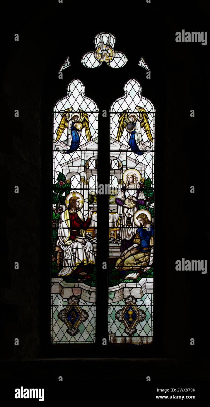 Stained Glass Window Depicting Jesus At The House Of Mary And Martha At The Church Of St Thomas The Apostle, 1948, Lymington,UK Stock Photo