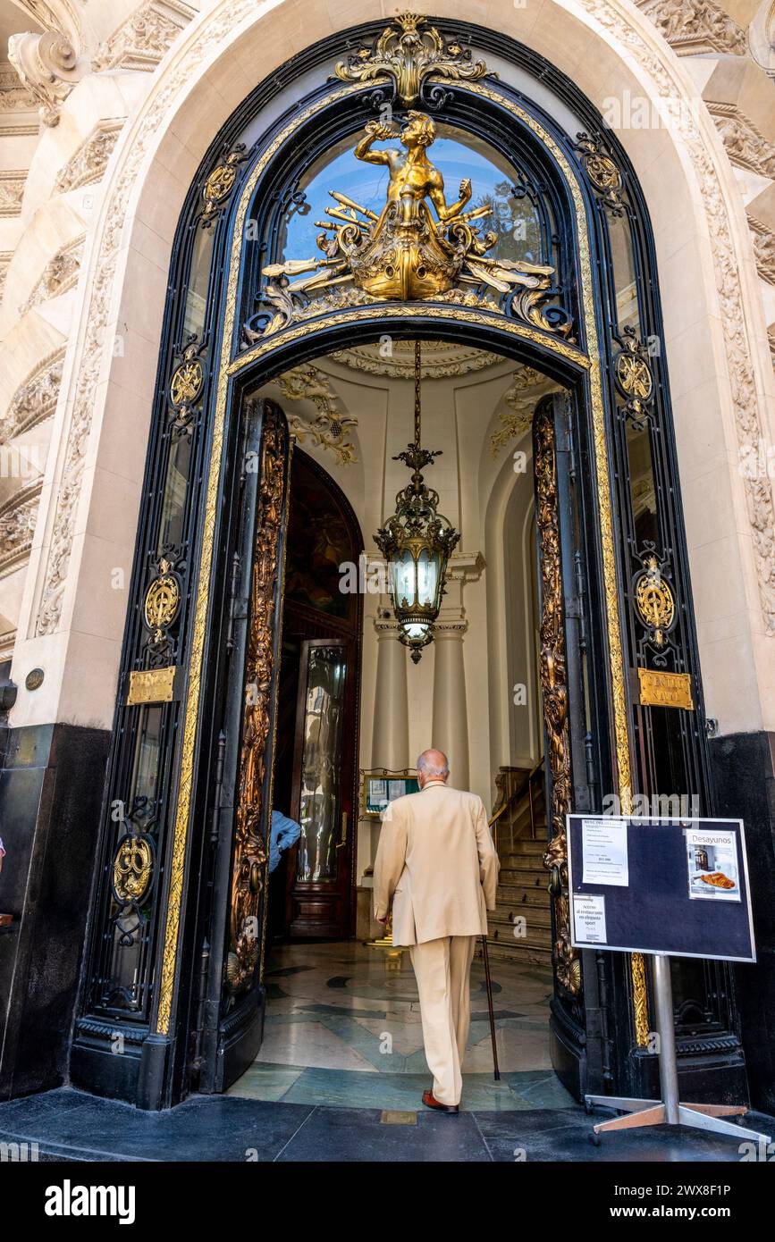 A Well Dressed Man Enters The Centro Naval (Sede Central) Social Club Building, Calle Florida, Buenos Aires, Argentina. Stock Photo