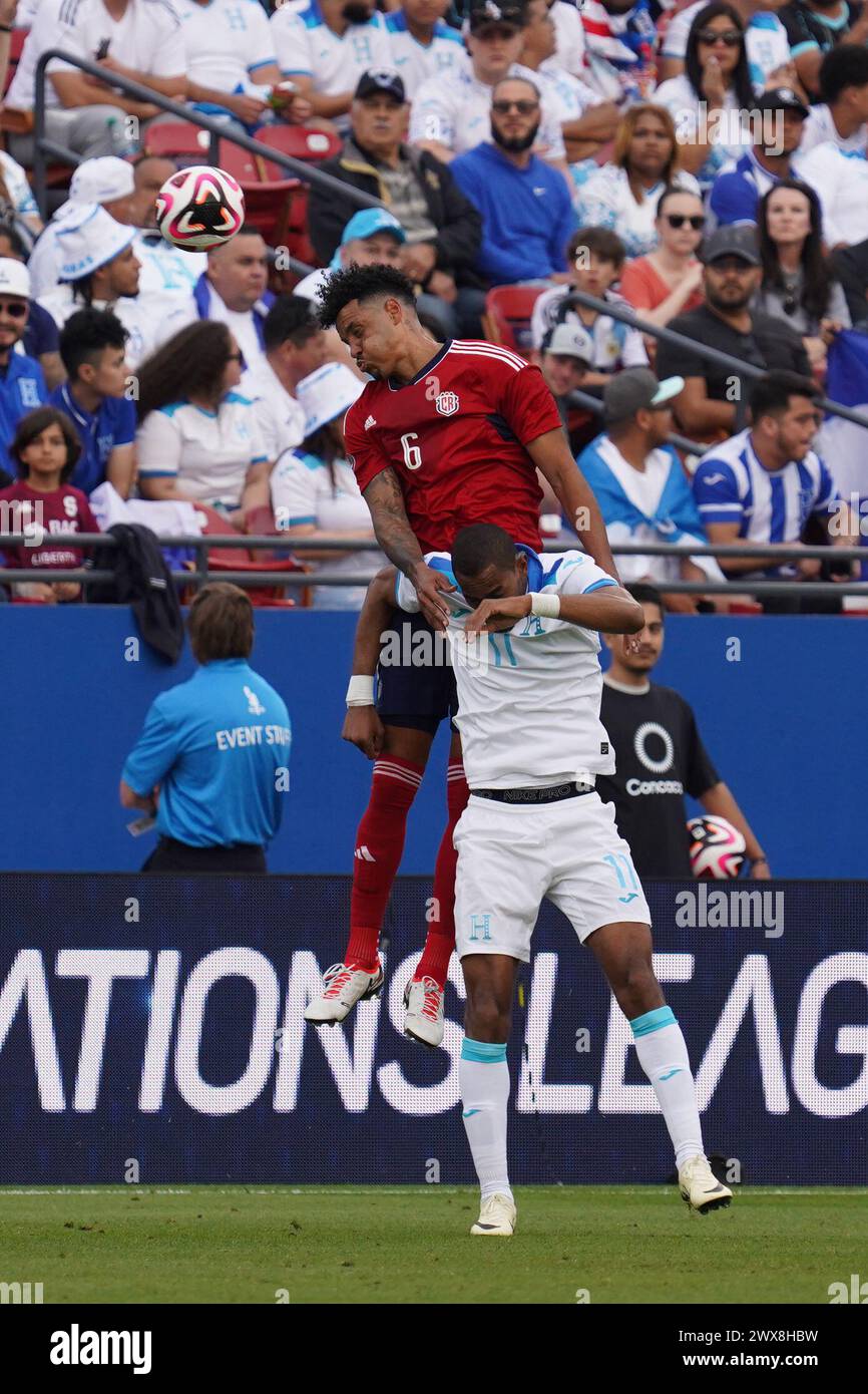 Arlington, United States. 23rd Mar, 2024. March 23, 2024, Frisco, Texas: Julio Cascante #6 of Costa Rica and Jerry Bengtson #11 of Honduras battle for the header during Play-In Concacaf Nations League match between Costa Rica and Honduras at Toyota Stadium. Jamaica won 1-0. on March 23, 2024, Frisco, Texas. (Photo by Javier Vicencio/Eyepix Group/Sipa USA) Credit: Sipa USA/Alamy Live News Stock Photo