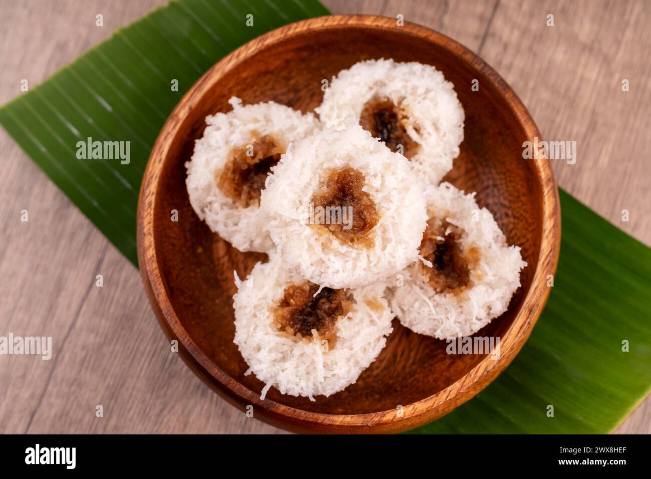 High angle view of putu bambu or steamed rice flour cake with grated coconut and palm sugar filling Stock Photo