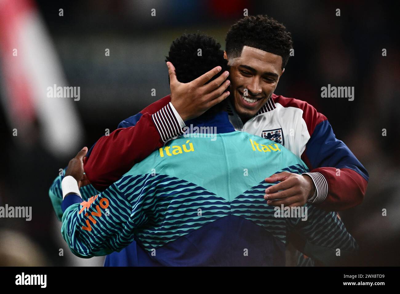 LONDON, ENGLAND - MARCH 23: Jude Bellingham of England and Vinicius Junior of Brazil before the international friendly match between England and Brazi Stock Photo