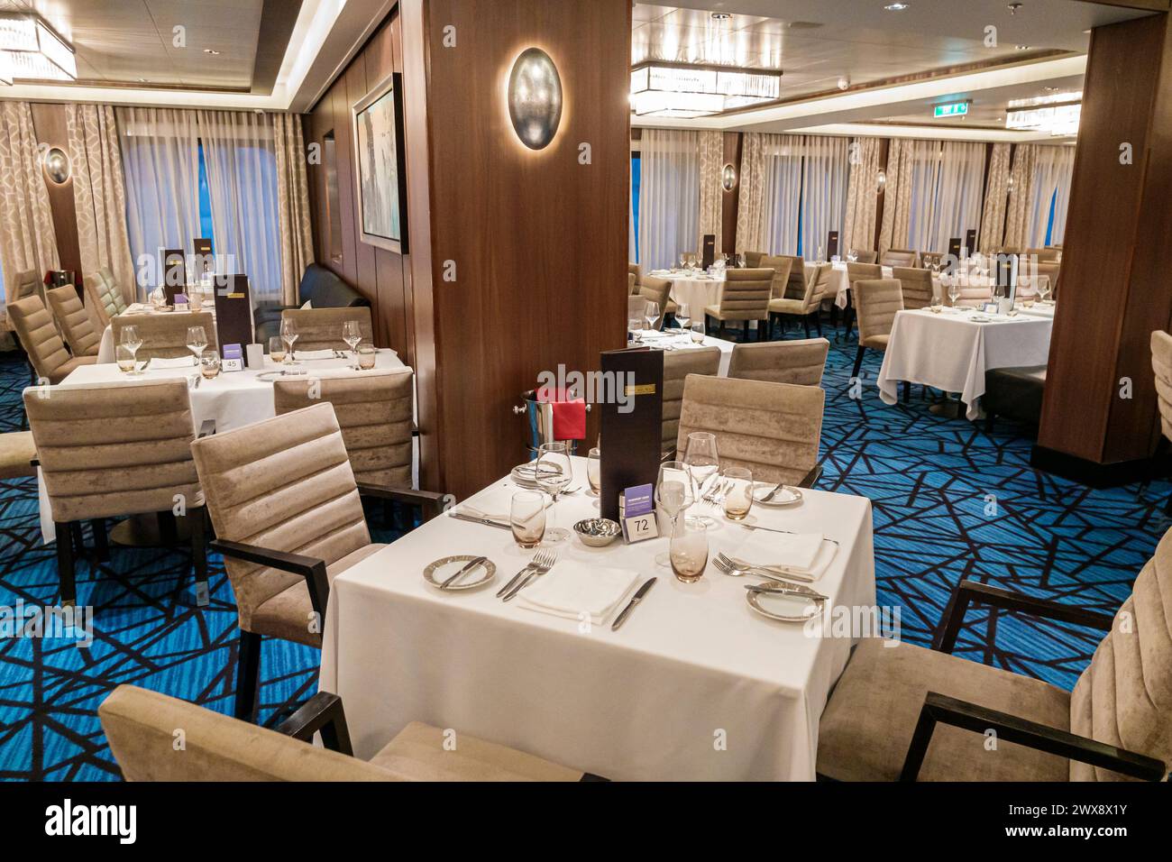 Miami Florida,PortMiami Port of Miami,onboard inside interior,Norwegian Joy Cruise Line ship,7-day Caribbean,Cagney's Steakhouse,dining room,chairs ta Stock Photo