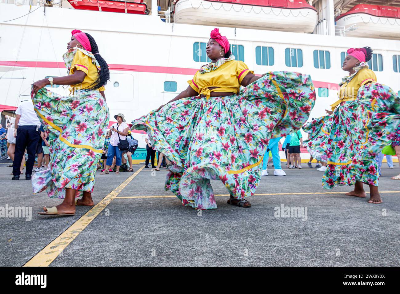 Port Roatan Honduras,Coxen Hole Bay Islands,Norwegian Joy Cruise Line ship,7-day Caribbean Sea itinerary,Garifuna Punta dancers musicians,preforming a Stock Photo