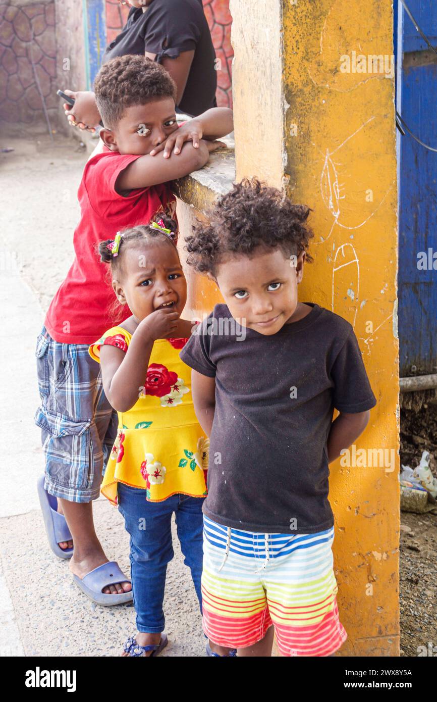 Port Roatan Honduras,Coxen Hole,Bay Islands,Main Street,Black Blacks African,ethnic ethnicity,minority minorities,child children childhood,kid kids,gi Stock Photo