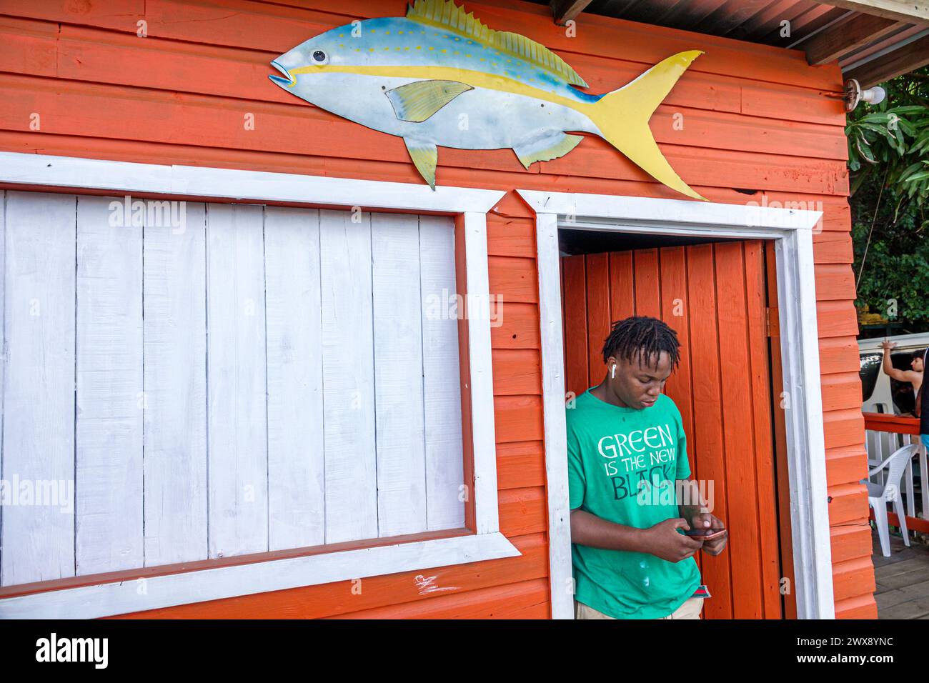 Port Roatan Honduras,Coxen Hole,Bay Islands,Main Street,Black Blacks African,ethnic ethnicity,minority minorities,man men male,adult adults resident r Stock Photo