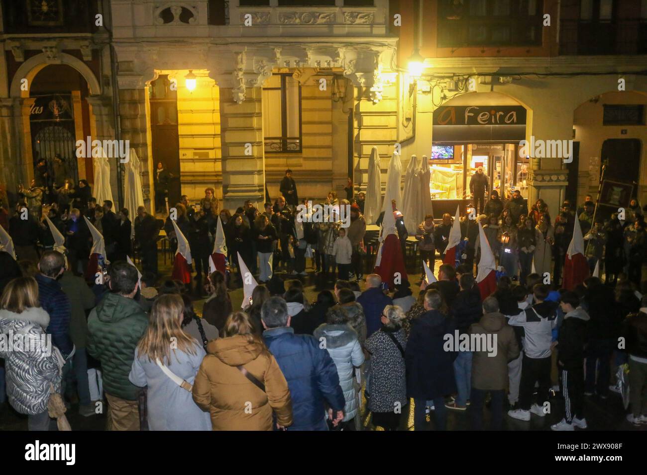 Avilés, Spain, March 28, 2024: Thousands of people took to the streets of Avilés braving the rain during the Procession of Silence, on March 28, 2024, in Avilés, Spain. Credit: Alberto Brevers / Alamy Live News. Stock Photo
