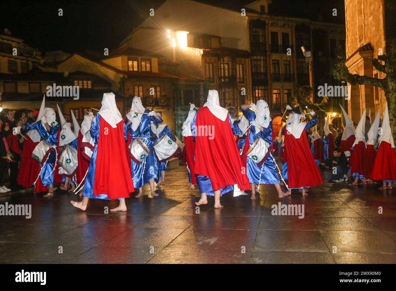 Avilés, Spain, March 28, 2024: The music band of the Brotherhood of San Juan Evangelista playing during the Procession of Silence, on March 28, 2024, in Avilés, Spain. Credit: Alberto Brevers / Alamy Live News. Stock Photo