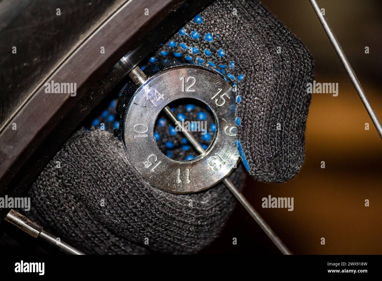 Bicycle repair. Adjust the tension of the spokes on the wheel of the