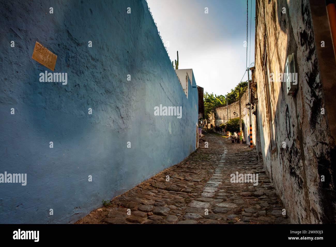 Beautiful antique streets of the Heritage Town of Honda located in the department of Tolima in Colombia. Long slope. Stock Photo