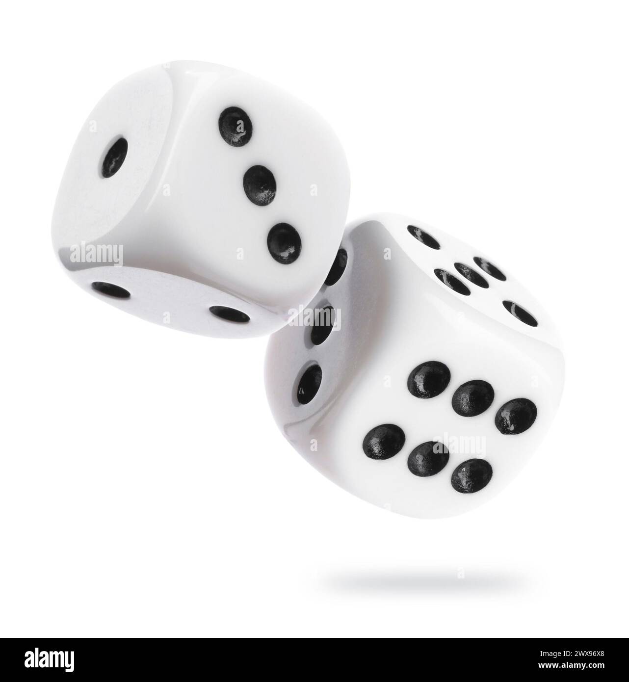 Two dice in air on white background Stock Photo - Alamy